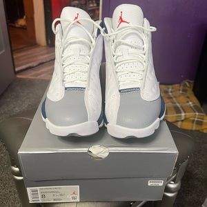 Blue, white and gray Jordan 13s